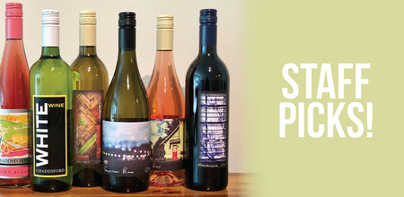 Staff Pick wines are lined up on the left. On the right, cream background with the following white text" Staff Picks!"