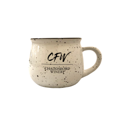 White mug with black speckles, The black CFW logo is in the center